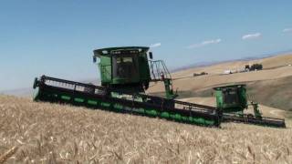 John Deere STS combines equipped with Hillco Hillside Leveling Systems [upl. by Qooraf]