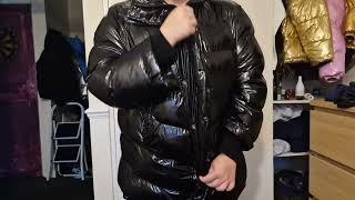 zipping and unzipping shiny black puffer jacket [upl. by Eylsel]