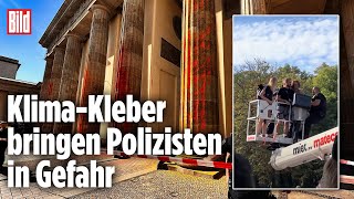 Polizisten entern Hebebühne bei KlimaKleberAttacke aufs Brandenburger Tor [upl. by Maxa]