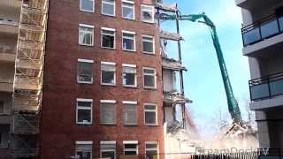 GIANT EXCAVATOR EATING LARGE BUILDING DEMOLITION CONSTRUCTION SITE [upl. by Amand67]