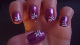 Video tutorial 5 Nail Art unghie Come fare un fiocchetto con lo smalto semplice e decorativowmv [upl. by Aicirtal433]