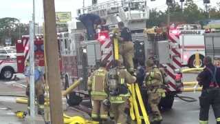 Firemen Putting Hose On Fire Truck [upl. by Hardunn]