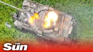 Russian tank is blown to bits by Ukrainian drone strike [upl. by Ahsekim]