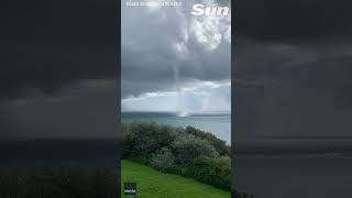 Huge waterspout spotted off the coast of the Isle of Wight shorts [upl. by Aronaele]