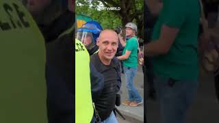 Farright protesters clash with British police in Bristol [upl. by Ayahs]