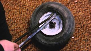 How To Dismount And Mount lawn Mower Tire With Hand Tools [upl. by Gnol]