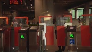 Metro fare evaders push through gates designed to prevent people from jumping over [upl. by Ycinuq]