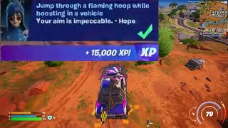 Jump through a flaming hoop while boosting in a vehicle Fortnite [upl. by Nalak]