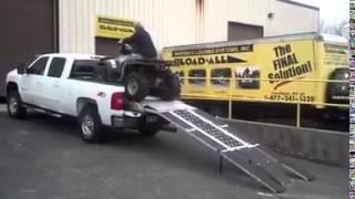 Loading an atv into a pickup truck with a loadall ramp [upl. by Ecirtnom]