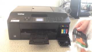 How to change a ink cartridge on a ink jet brother printer [upl. by Ahsieni298]