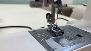 How to use the threader on your sewing machine  Elna eXperience 550 [upl. by Bikales]