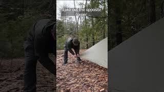 Setting Up a Plow Point Tarp Shelter for Survival [upl. by Fonville940]