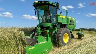 JOHN DEERE W200M Windrower Mowing Rye [upl. by Arhsub]