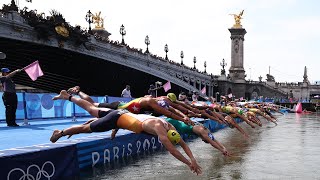 Fans react as Olympic triathlon mixed relay kicks off on Seine River [upl. by Gnak225]