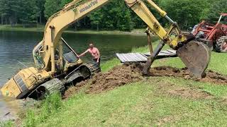 Excavator stuck in the lake [upl. by Ramahs514]