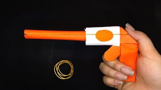 Origami colt gun  how to make paper gun that shoots rubber band [upl. by Seabury547]