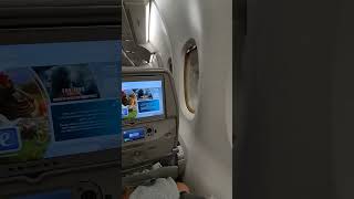 Economy class window seat on Emirates Airbus A388 flying from Manchester to Dubai travel flight [upl. by Anoyk]