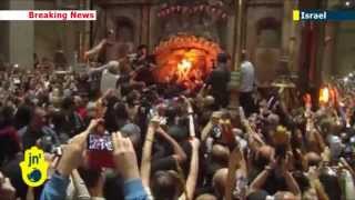 Holy Fire in Jerusalem Orthodox Christians celebrate annual Easter miracle in Old City [upl. by Rezeile]