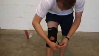 Mueller 231 Wraparound Knee Brace  Firstaid4sportcouk [upl. by Albie713]