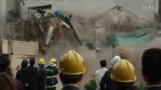 Buildings in China swallowed by sinkhole [upl. by Mandal328]